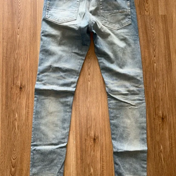AMIRI Ripped Blue Denim jeans - Picture 3 of 4